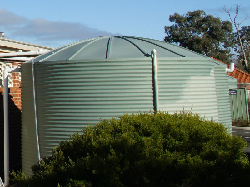 Diverting water tanks before moss treatment application