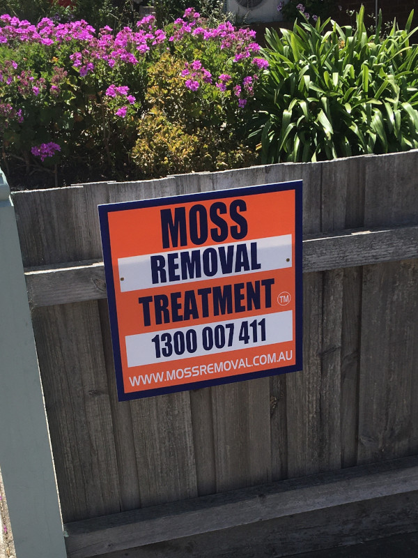 Job sign placed after Moss Roof Treatment application