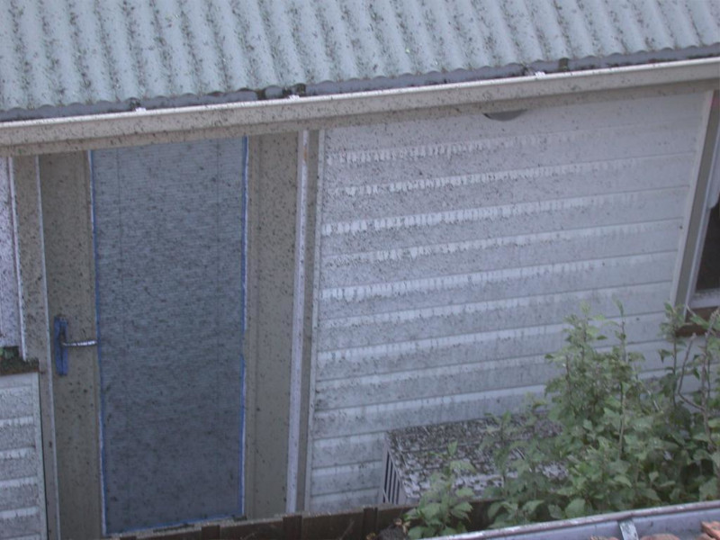 Dirt and debris left after messy high pressure cleaning