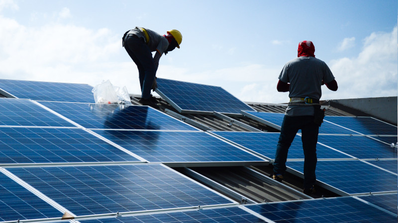 Installation of solar panels on a roof
