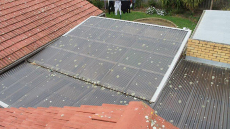 Laserlite roof before moss treatment showing organic growth